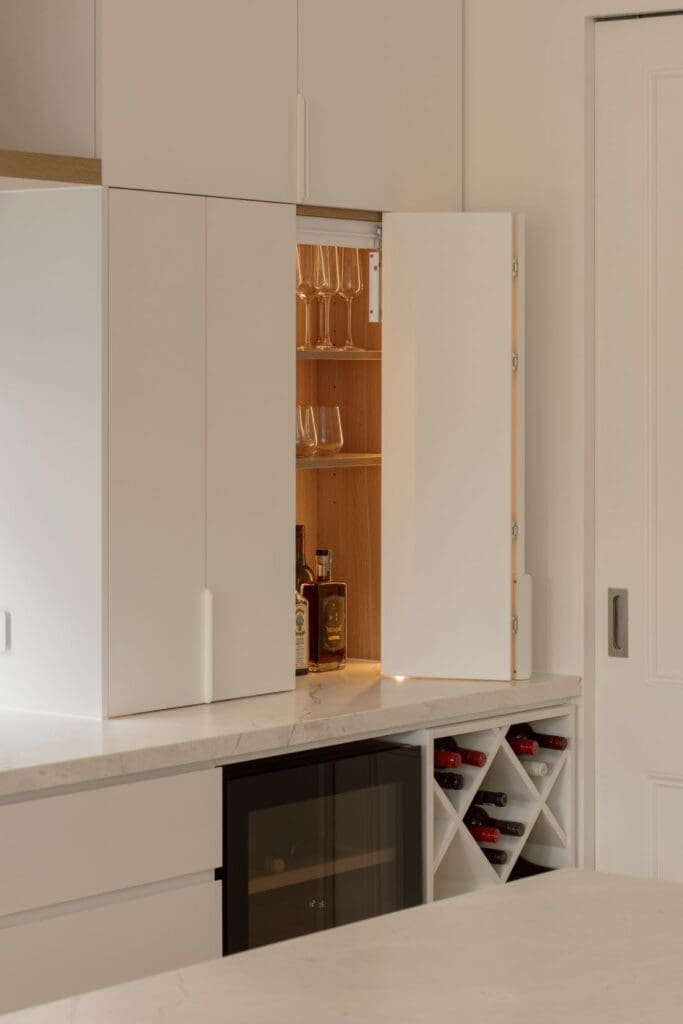 Mini home bar hidden behind pocket doors