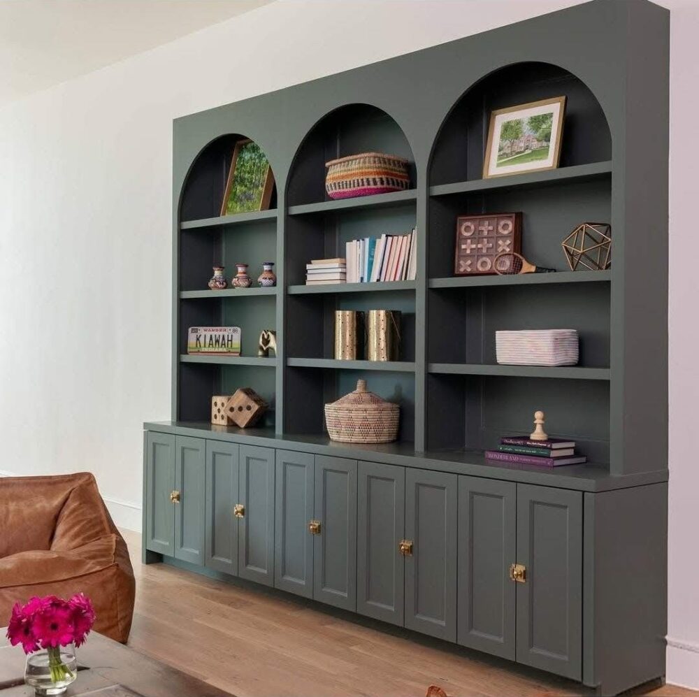 Dark green arch bookcase