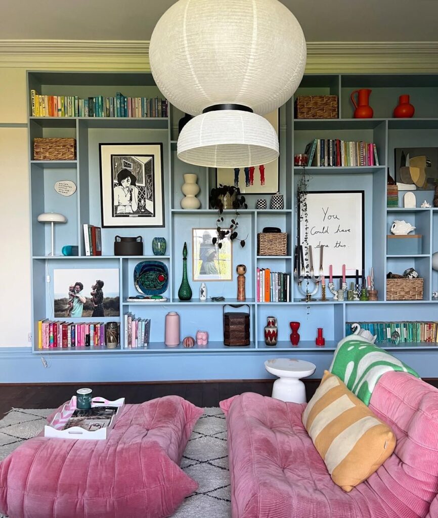 Blue painted bookcase in living room