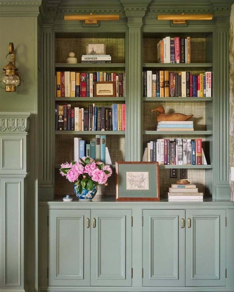 Sage green colour drench bookcase