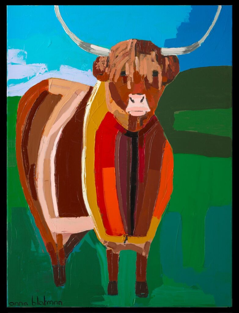 Bold highland cow in vibrant landscape