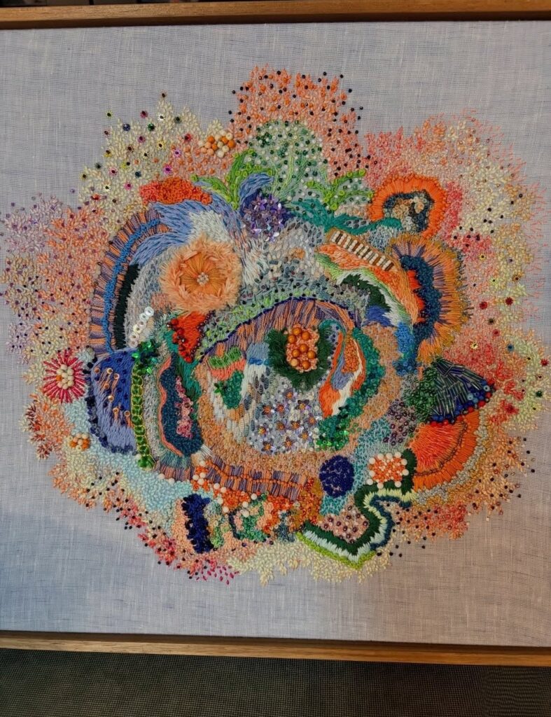 Ocean kaleidoscope embroidered artwork by Elizabeth Sullivan