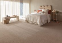 Warm neutral plush carpet in bedroom