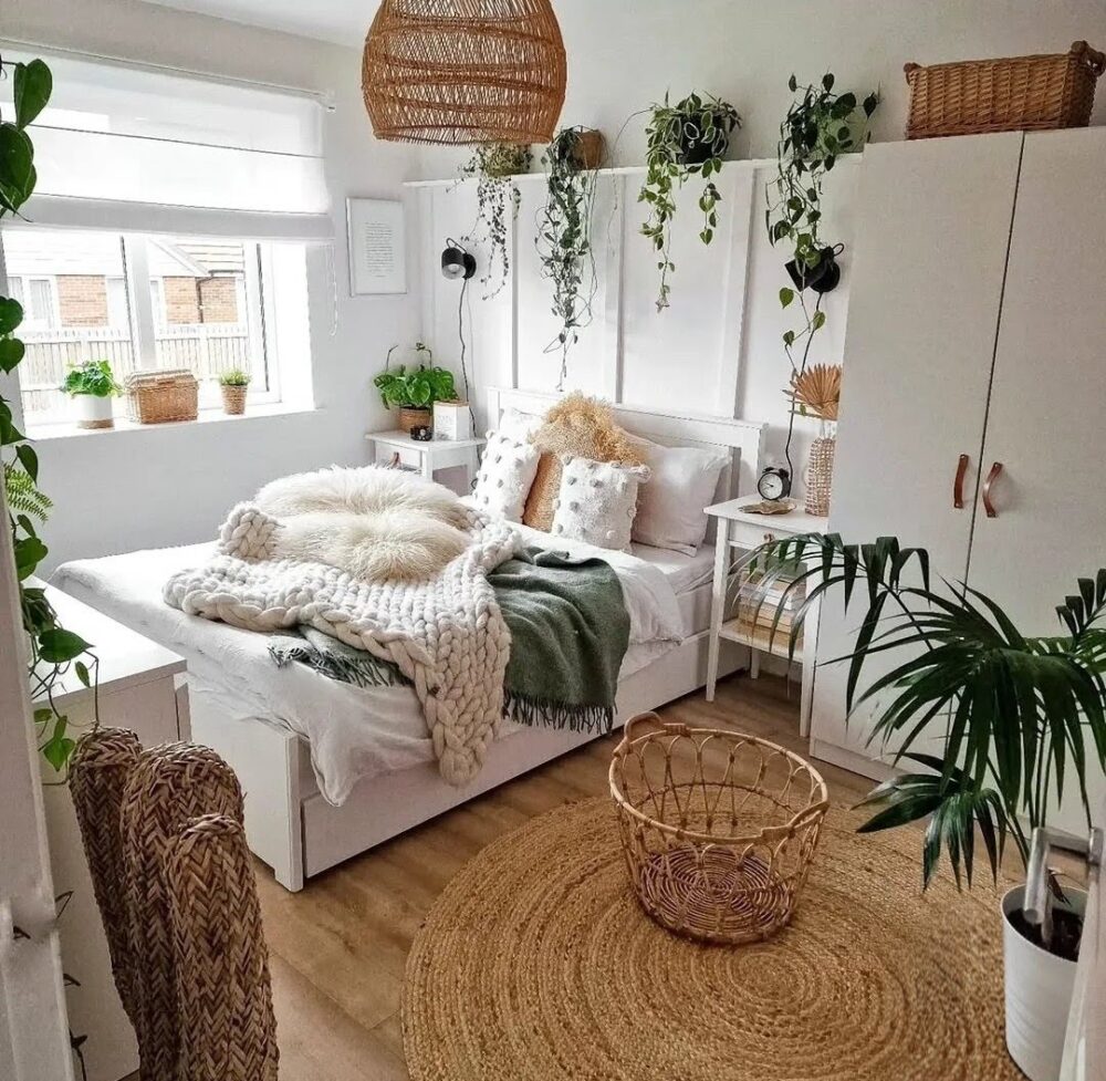 White scandi bedroom with lots of plants