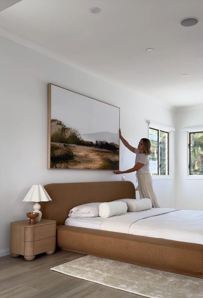 Large artwork as feature in bedroom