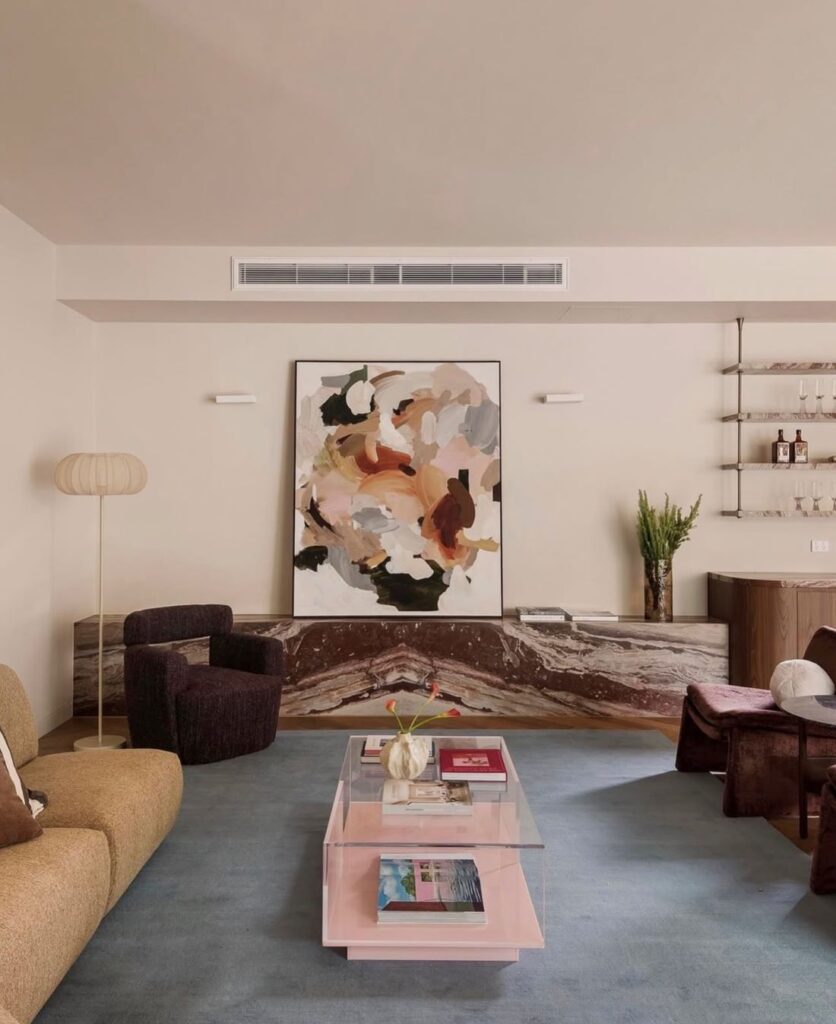 Abstract painting with neutral and earthy tones in interior