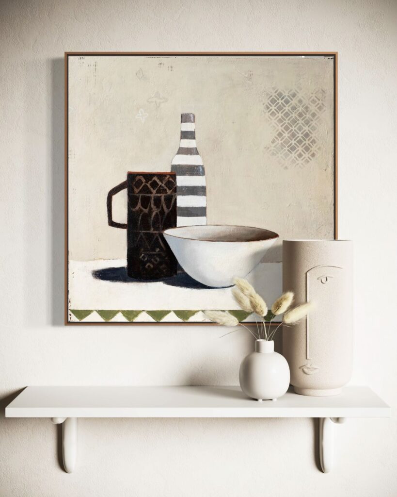 Framed still life painting with bowl, cup, and bottle