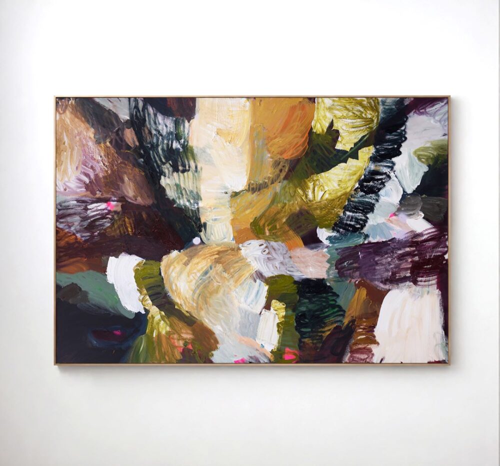 Abstract painting framed on white wall