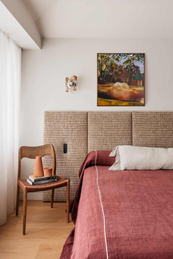 Modern bedroom with red linen bedding