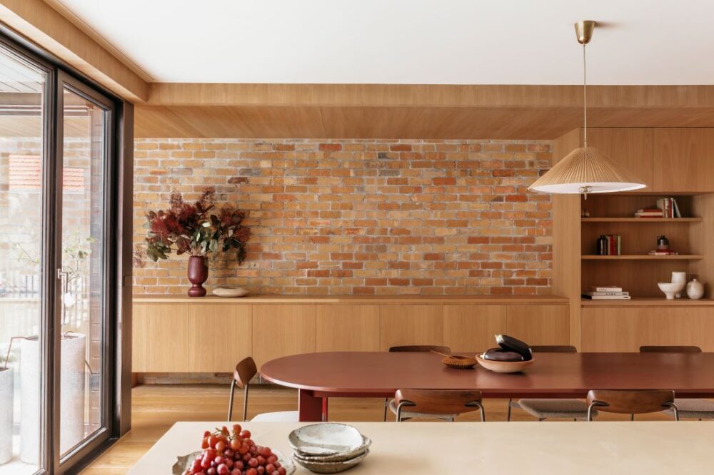 Modern dining room with brick wall