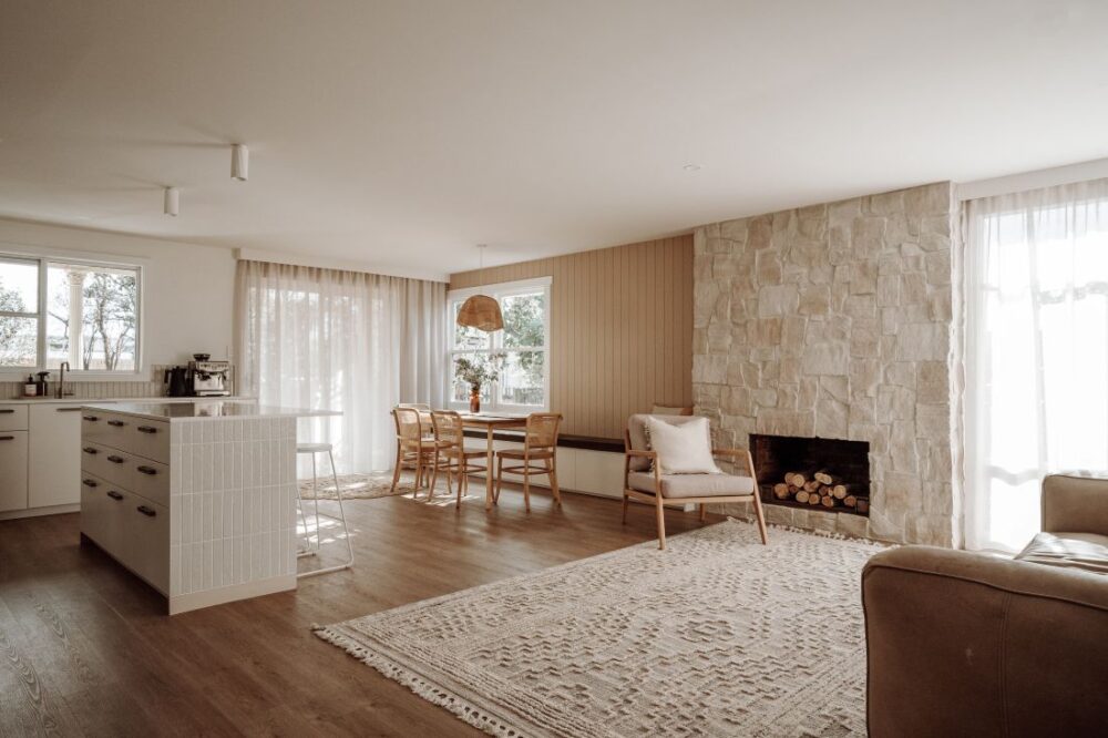 Open living area with stone fireplace