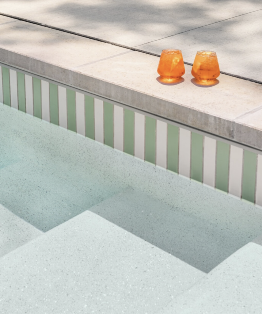 Waterline of stripe tiles in pool