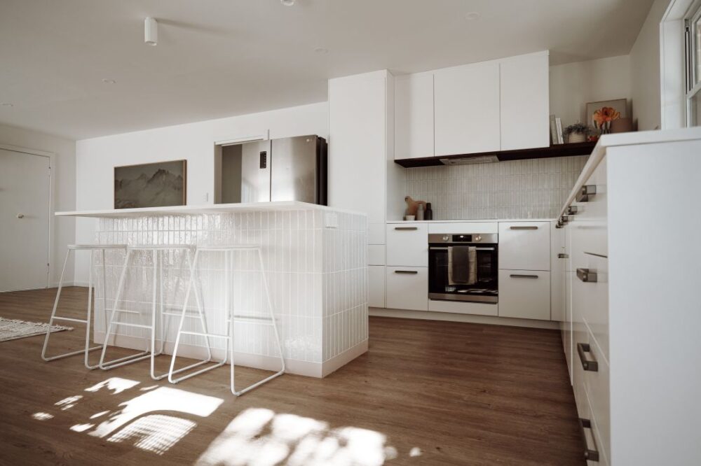 Sleek modern kitchen interior with breakfast bar