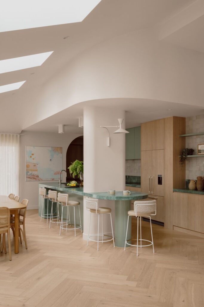 Hampton Home Kitchen with Curved Green Quartzite Island