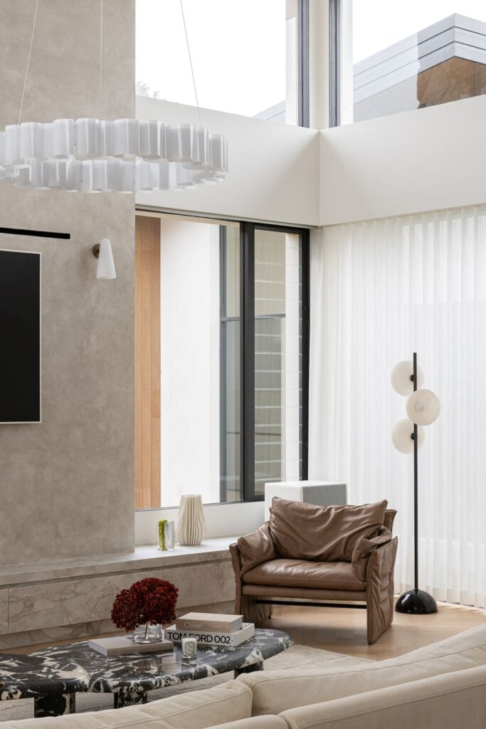 High-ceiling living room by designer Kate Vale