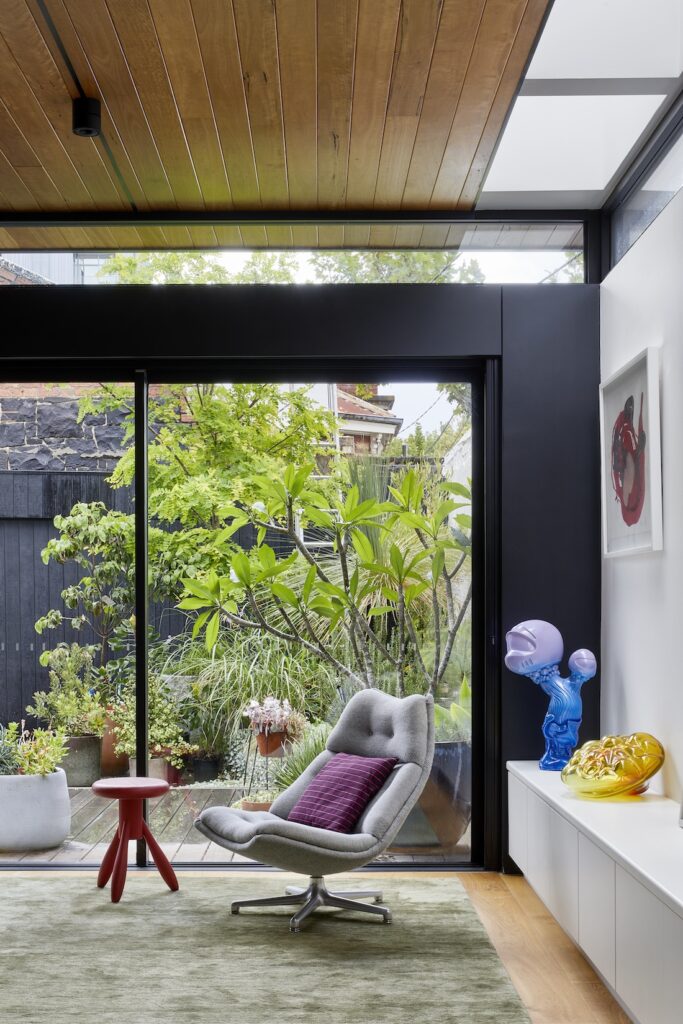 Interior of living space with occasional chair and coloured decor