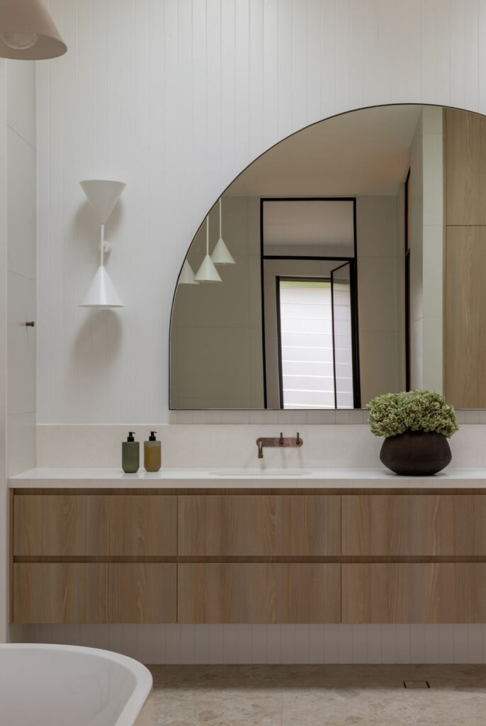 Large arch mirror vanity in Boronia House bathroom