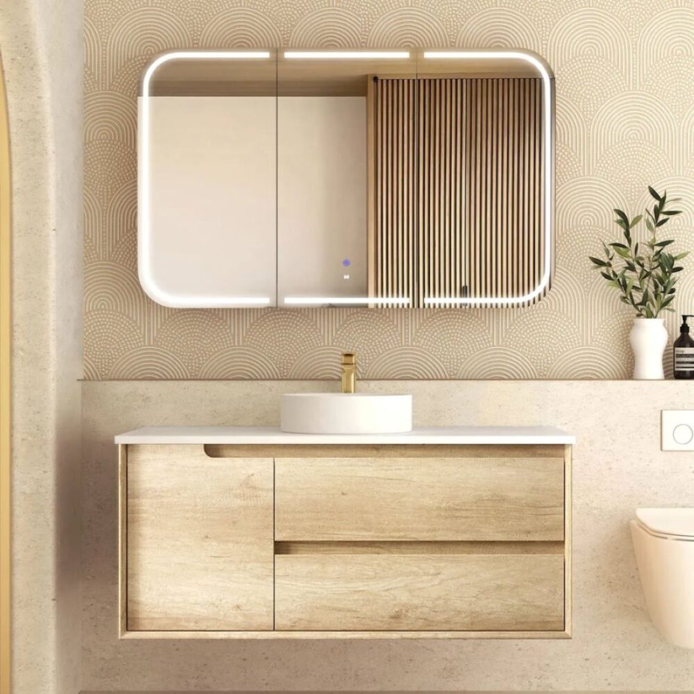 Light oak floating vanity under illuminated shaving cabinet