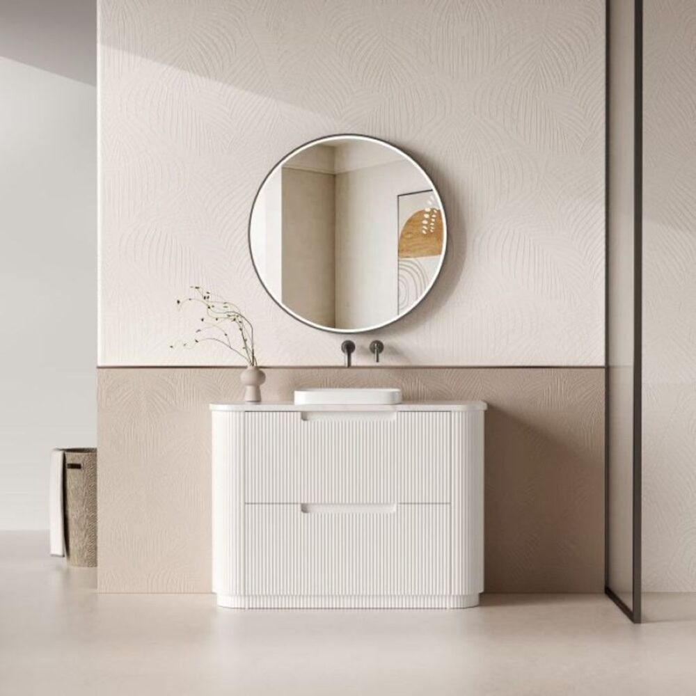 White fluted freestanding vanity with round mirror