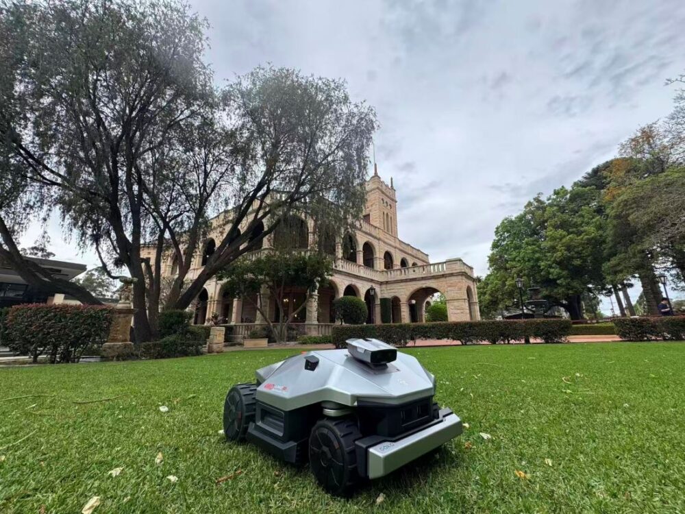 GOKO M6 robot lawn mower on a large garden lawn