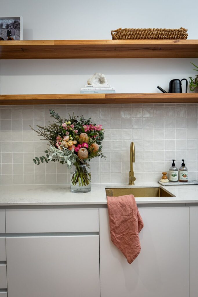 Native Australian bouquet on white kitchen counter